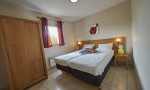 SDDL 2 vakantiepark Frankrijk luxe villa Dordogne zwembad kindvriendelijk bed slaapkamer.jpg