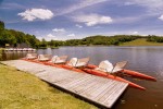 Lac du Tolerme 9 Frankrijk Dordogne Lot villa strand zand moeder en kind spelen met schep bij vakan